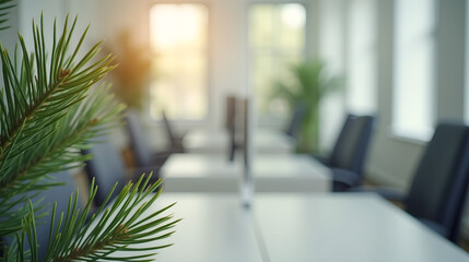 Pine needle cluster placed on bright office desk with soft focus background
