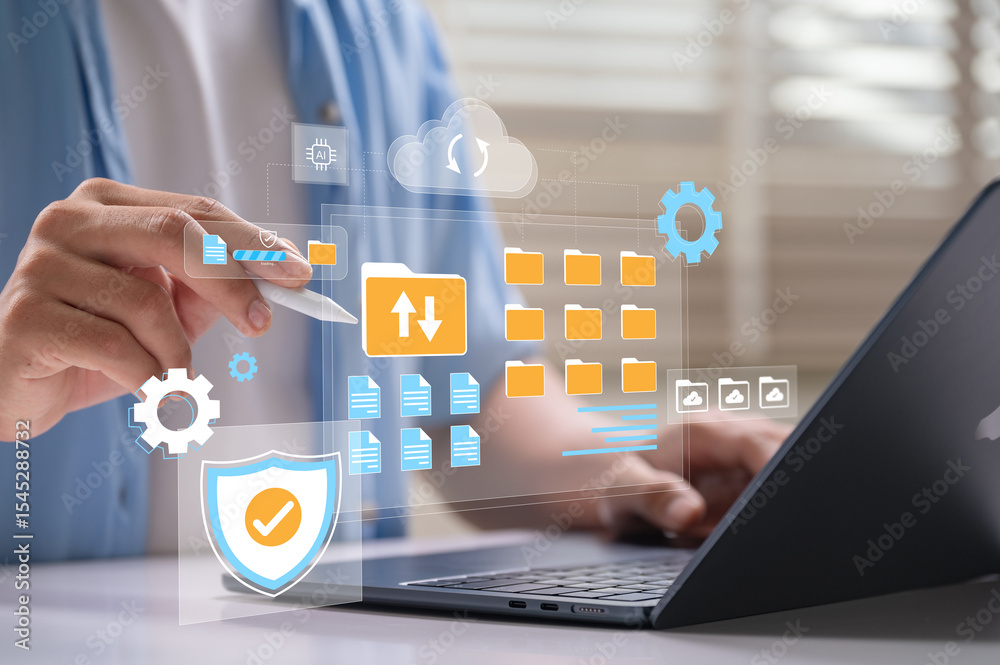 Fototapete Digital file management and cloud storage system with user using stylus to organize secure folders and upload data on laptop interface for productivity, cybersecurity and document backup