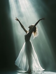 Naklejka premium A dancer performs alone under soft light, with a backdrop of hazy shadows
