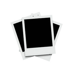 Stacked instant photo prints with blank frames on transparent background  