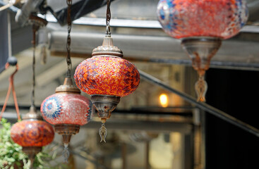 Colorful mosaic lamps glow in Grand Bazaar