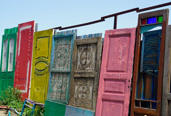Old colorful wooden door with panels