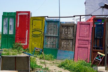 Old colorful wooden door with panels