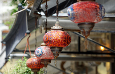Colorful mosaic lamps glow in Grand Bazaar