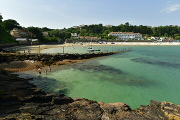 St.Brelade bay and harbour, Jersey, U.K. High tide in the Summer on the longest day.