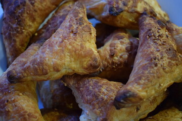Flaky Triangular Pastries in a Bowl