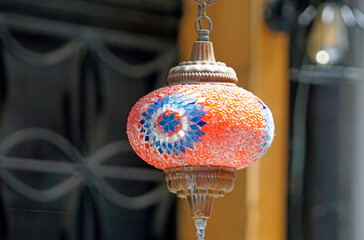 Colorful mosaic lamps glow in Grand Bazaar