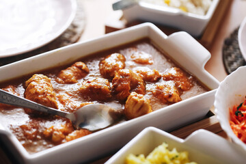 Sunday lunch with meat in gravy. Homemade meatballs in rich sauce. Traditional family dinner served...