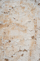 Old cracked clay wall. Deep cracks. Abstract crack texture