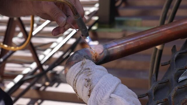 copper pipes are soldered with gas