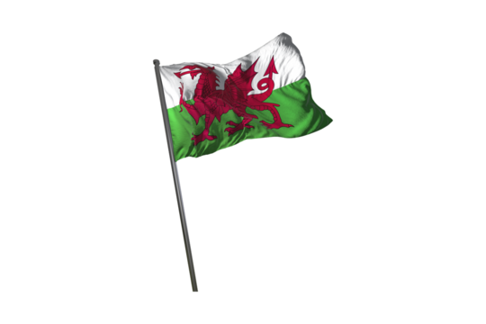 The national flag of wales waving in the wind against a black background