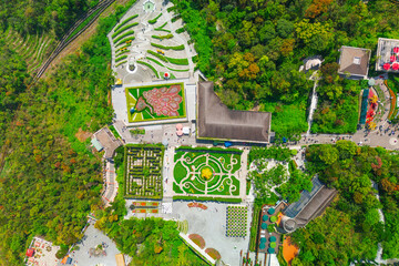 Aerial view panoramic overlook view from the top height of the air park bushes flower beds...