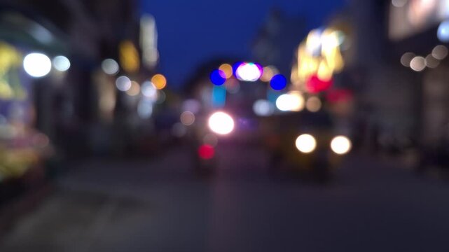 night city street, 4K, Defocused Traffic, Travel or Transportation Concept, Headlights of vehicles creating a beautiful bokeh effect, blurred footage ideal for b rolls and cinematic backdrop. Travel.