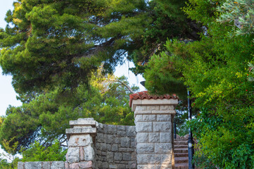 Hiking Path along the rock and sea, Sveti Stefan Park in Montenegro. Stone path to Milocer Park