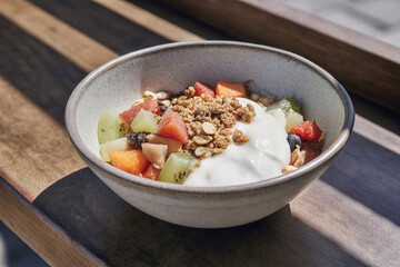 a bowl of healthy aussie breakfast bowl with fresh fruit