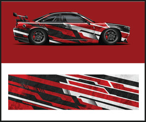 Obraz premium Sleek Sports Car with Custom Red White and Black Racing Graphic Wrap