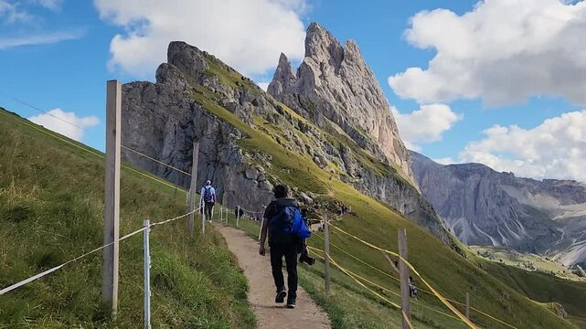 Man hiking at Seceda mountain in Val Gardena Bolzano Italy