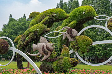 Fantastic garden, plants shaped like leaping dolphins