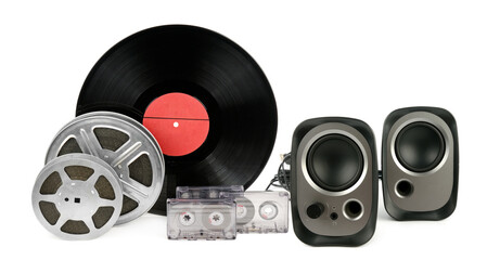 Music speakers, filmstrip, audio cassettes, vinyl disc isolated on white background.