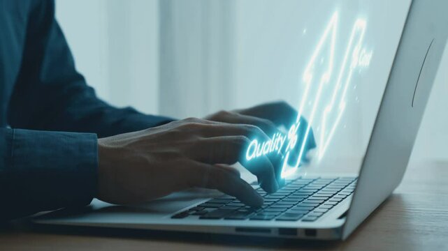 Professional hand typing on laptop with glowing arrows symbolizing progress, quality, and innovation in a modern digital workspace environment. Qubit.