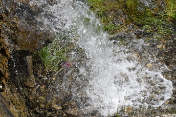 water flowing over rocks