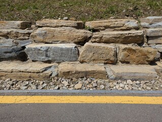 stone foundation on the side of the road
