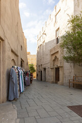 Old town in Al Seef Cultural Historical District on shores of Dubai Creek. Tourist place with old...