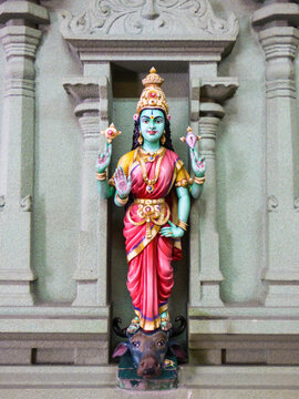 Kuala Lumpur, Malaysia - Circa October 2017: Statue of a green Hindu Goddess stepping on a cow head Sri Mahamariamman Temple in Kuala Lumpur - Oldest Hindu temple in the Malaysian capital city