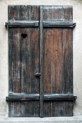 Rustic Weathered Wooden Door with Heart Cutout