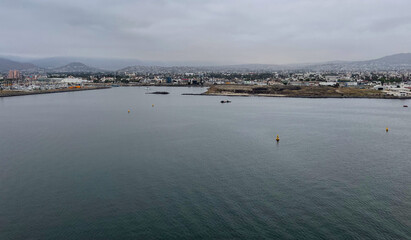 Ensenada, Mexico, June 5, 2025: The Entrance to Ensenada Harbor looking at the industrial Quay Dock where ships are repaired and anchored