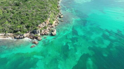 Top-down drone view of a green-covered cliff and gradient ocean. Peaceful and vibrant coastal scene.
Best for: Meditation visuals, travel vlogs, environment projects.