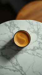 Overhead View of Coffee Cup on Marble Surface vertical