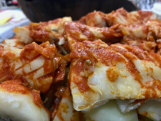 Traditional Basque Codfish Dish with Red Sauce