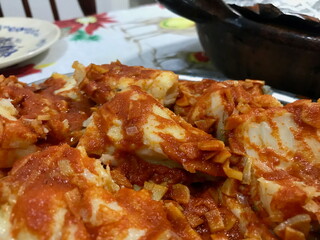 Traditional Basque Codfish Dish with Red Sauce