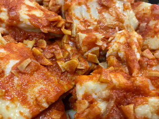 Traditional Basque Codfish Dish with Red Sauce