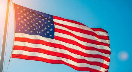 Obraz premium Vibrant american flag against a clear blue sky