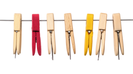 Colorful Clothespins Hanging on a Wire Against a White Background for Creative and Domestic Use