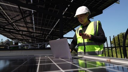 Close-up of engineer's hand testing a solar panel with measurement device, solar energy maintenance and green technology. - Powered by Adobe