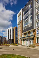 New modern block of flats in green area. residential apartment with flat buildings exterior. luxury house complex. Part of City Real estate property, condo architecture. apartment insurance concept