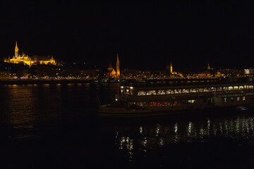 Danube embankment at the evening and night. Autumn in Budapest. Old architecture. High resolution...