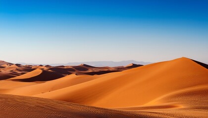 vast desert dunes under clear blue sky expansive landscape perfect for travel promotions and advertising
