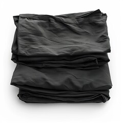 A neatly folded stack of dark fabric, suitable for various uses. on white background
