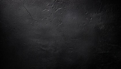 rough black wall texture background with a dark concrete floor or an old grunge appearance
