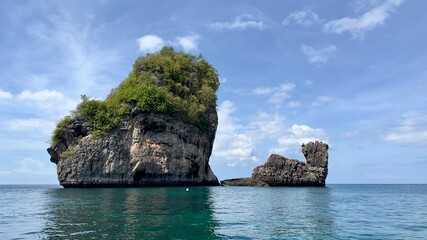 Camel Shaped Krast Rock in Phuket Thailand on sunny blue sky - concept of nature's wonder