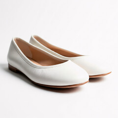 Pair of white women's shoes isolated on a white background.