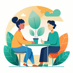 Two people sitting at a table with a plant between them