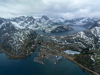 Dramatic Drone View of Snowy Mountains and Fjords in Lofoten, Norway – Isolated Fishing Outpost,...