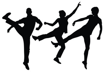 Silhouette of friends dancing legs kicking up high