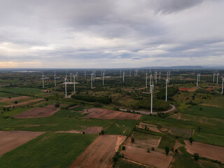 Aerial view of a wind turbine, symbolizing renewable energy technology, clean power, sustainability, and environmental awareness.