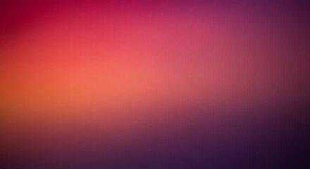 Soft focus color blend from vivid pink to warm orange and deep plum, providing depth.
